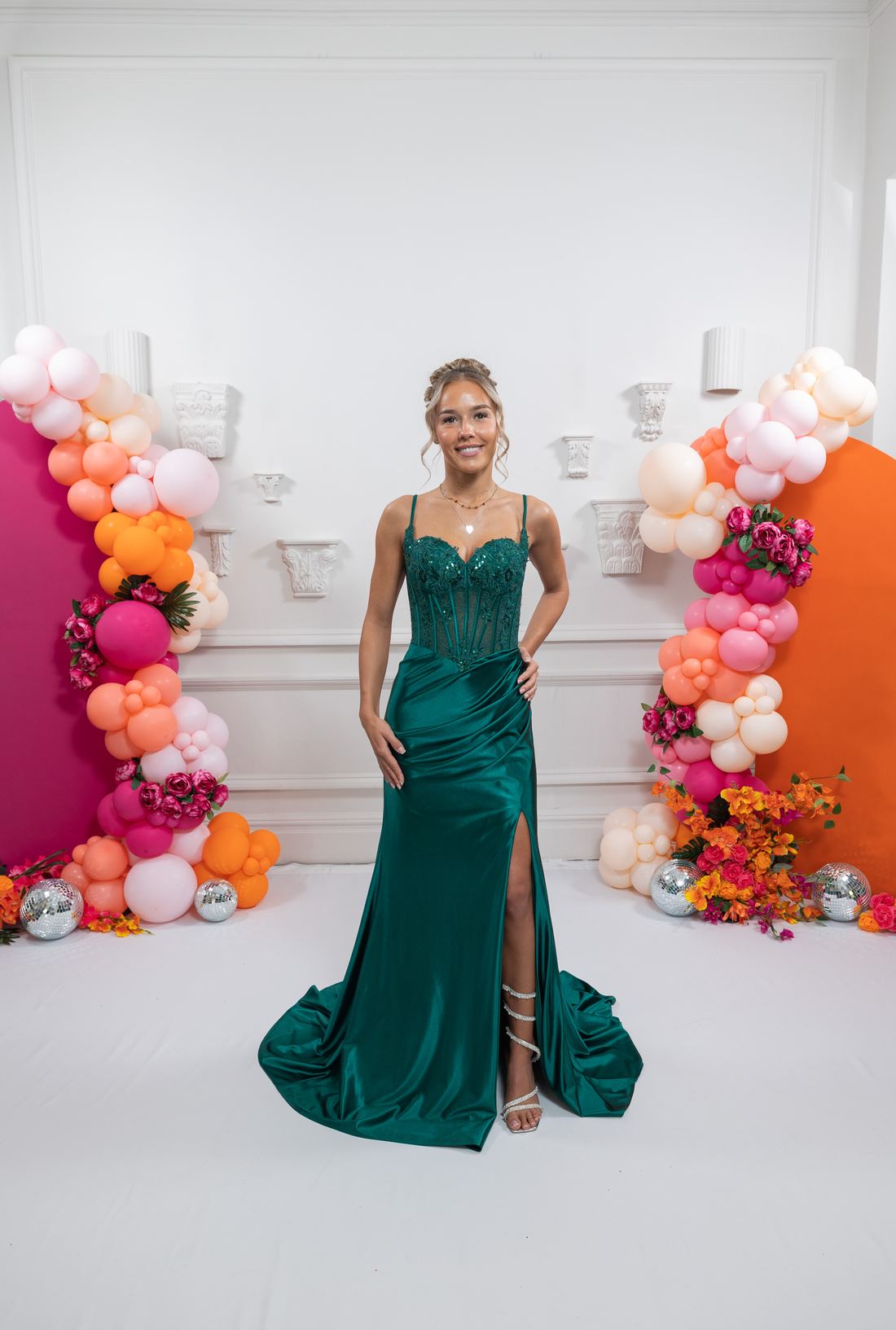 green satin fitted prom gown