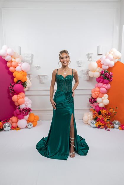 green satin fitted prom gown